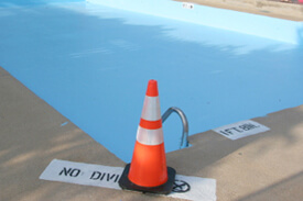 Crystal Clear Pools - safety cone at a pool corner 