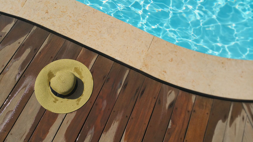 Cover Your Pool with Bubble Cover and Save! - Hat on Poolside
