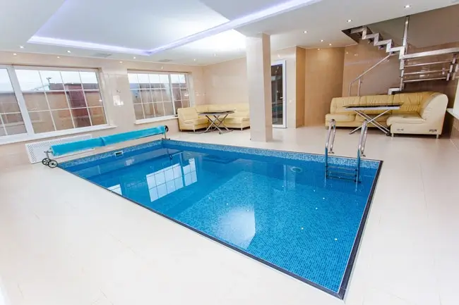 Crystal Clear Pools - 2026 Pool Cover Rebates - Pool with rolled pool cover